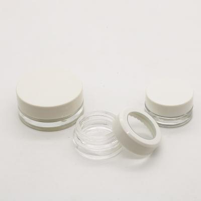 China 1oz 2oz 3ml 10g Eco-friendly Wide Mouth Cosmetic Glass Jar Thick Clear Cream Jars Cosmetic Containers With Screw Lid for sale