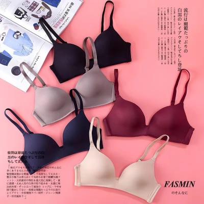 China JUNXI Dropshipping QUICK DRY girls shape simple solid color push up wireless bra T-shirt comfort women's ladies seamless bra for sale