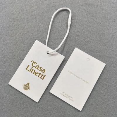 China Luxury Custom Recyled Logo White Paper Hang Tag Thickness For Apparel Print Clothes Hang Tag Labels With String for sale