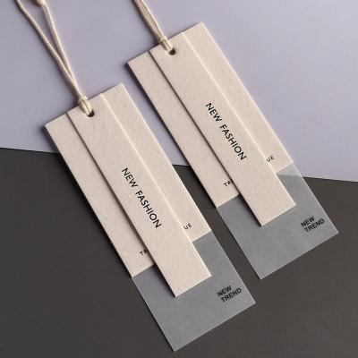 China Print Recyled Factory Logo Clothes Hangtags With Luxury Custom Logo Swing Tags Set To Hang Clothes Hang Paper Tags for sale