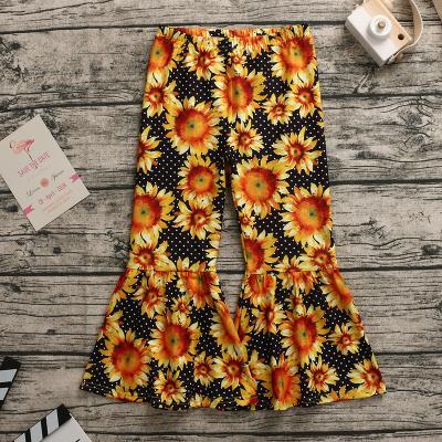 China Breathable Kids Scare Print Ruffle Tiered Bell Bottoms Outfits Kids Sunflower Flared Pants Girls Sunflower Bell Bottoms for sale