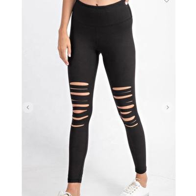 China Wholesale Fashion Breathable Soft Ripped Distressed Sport Pants Waist Wide Black Laser Cut Yoga Leggings for sale