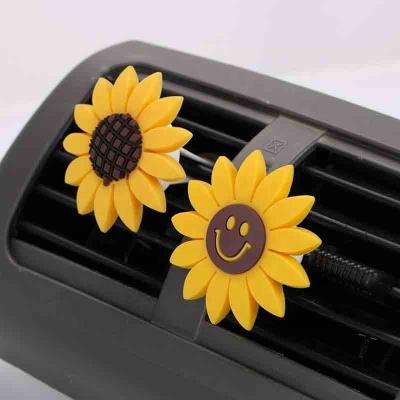 China Free Shipping Cute Car Air Freshener Christmas Gift Smile Face Car Accessories Used Exhale Staples Sunflower Car Air Freshener for sale