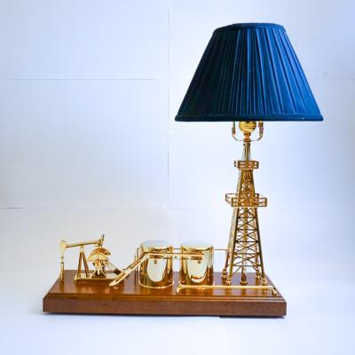 China Antique Imitation 24K Gold Plated Solid Brass Oil Derrick + Pump Jack + Barrels LAMP With Movement for sale