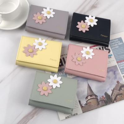 China Waterproof 2021 Flower Ladies Money Cartoon Teenager Cute Stylish Girls Pink Short Wallet for sale