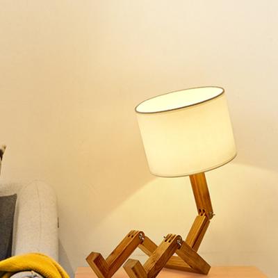 China Folding Table Lamp Creative European Fashion Bedroom wood robot art table lamp(WH-MTB-28) for sale