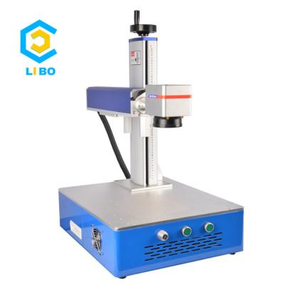 China Small Size Plastic Laser Marking 20W 30W 50W Metal Serial Numbers Marking Machine Laser Fiber Marking Machine for sale