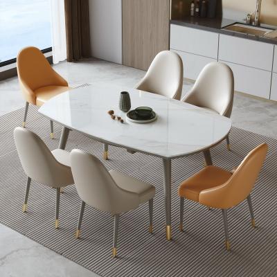 China Nordic Expandable Dining Table (Other) Gold Selling Rock Dining Table Slab Dining Table Set Adjustable Hot Luxury Round Bright Round Chair Combination for sale