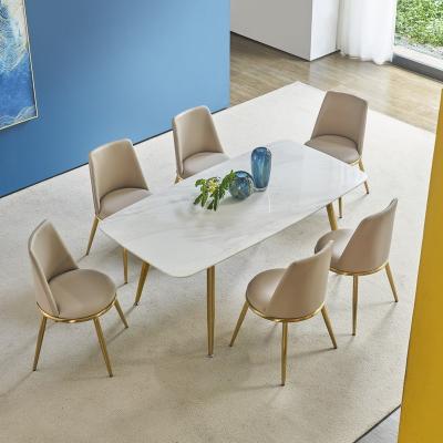 China (Other)Wholesale Gold Adjustable Nordic Luxury Marble Simple Dining Table Home Small Set Dining Table And Chairs Combination Dining Table for sale