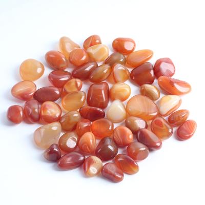 China Wholesale Natural Gemstone Polished Carnelian Red Agate Carnelian Tumbled Stone From China Tumbled Stone For Decoration for sale