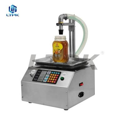 China LT-L15 Desktop Automatic High Viscosity Honey Small Liquid Weighing Filling Machine Electric Honey Bottle Filler Machine for sale