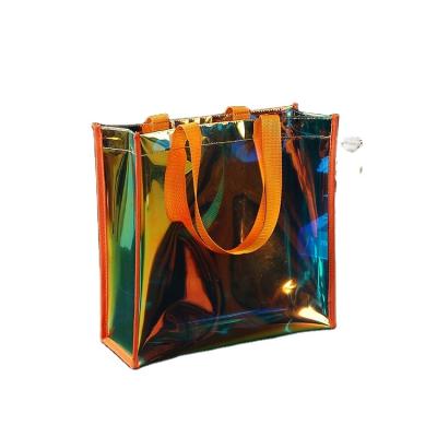 China Fashion Transparent Laser Effect PVC Bag Custom Personalized Waterproof Holographic Shopping Bag for sale