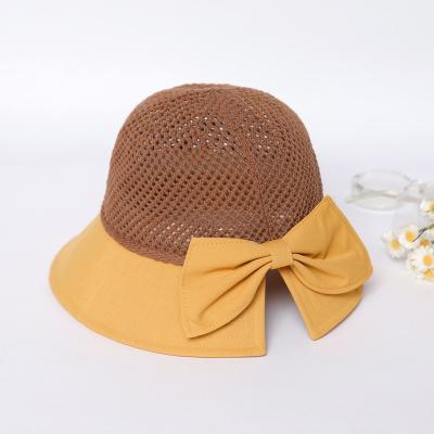 China Small Sun Protection Small Face Butterfly Character Metal Female Summer Vacation Fisherman Wild Hat Female Simple Standard Basin Hat for sale