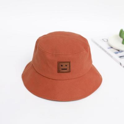 China Plain female face bucket hat smiley face character shadow face cover fisherman wild Korean summer style tide couple cover fisherman hat for sale