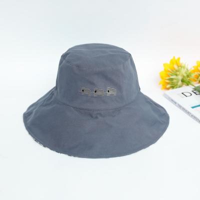 China Large Face Gutters Cover Fisherman Manufacturing Character Summer Female Double-Sided Direct Sun Shade Korean Printing Sun UV Hat for sale