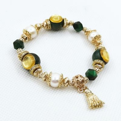 China India Resin Crystal Precious Metal Tiger Eye Esoteric Green Stone Natural Orgonite & Bracelets for sale