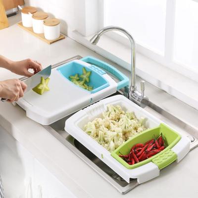 China Sustainable New Products Expandable Plastic Over Sink Cutting Board With Colander And Tray for sale