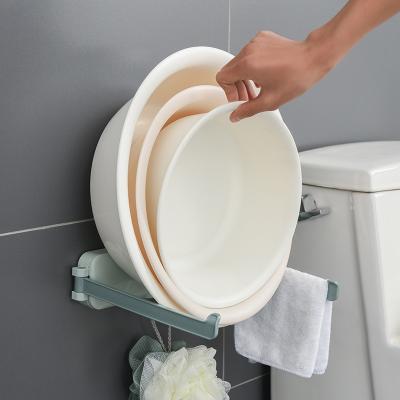 China Wall Mounted Plastic Toilet Shelf Rack Free Punching Bathroom Kitchen Storage Sink Rack Lavatory Shelf Holders for sale