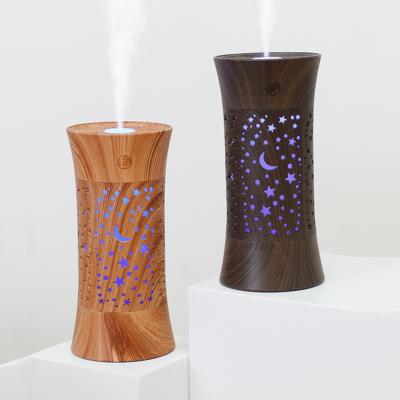 China Feel Comfortable Practical New Cavity Wood Grain Spray Atomization Led Ultrasonic Air Humidifier Home for sale