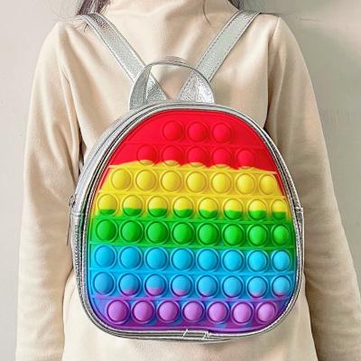 China Silica Gel New School Bag Satchel Rainbow Push Jumping Person Jumping Toys For Kids for sale