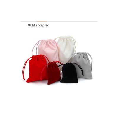 China Factory Custom printed velvet jewelry pouches drawstring gift bag envelope jewelry velvet pouch en venta