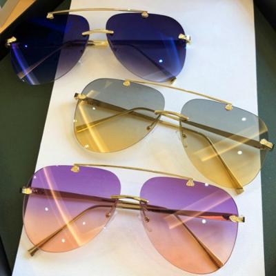 China Fashion Sunglasses 2020 Women Rimless Frame Sunglasses UV400 Gradient Metal Frame Sunglasses Men Fashion Shades Big for sale