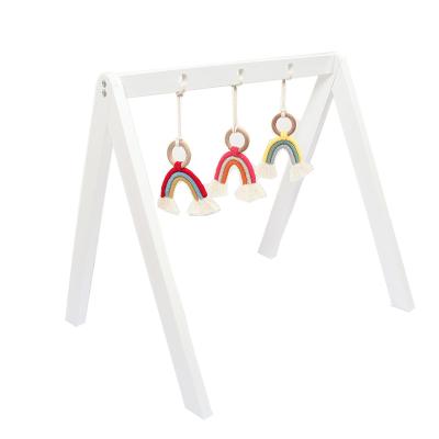 China Natural Non-Toxic Pine Wood Frame Baby Teething Wooden Frame Toy Hanging Activity Toy Rattle Play Gym for sale