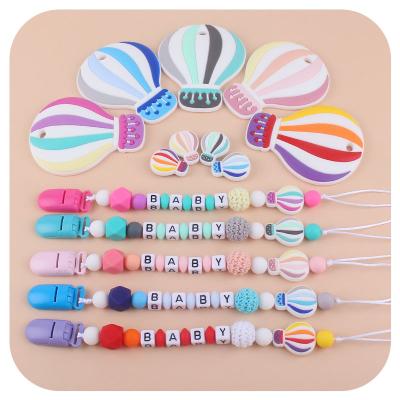 China Hot BPA Free Silicone Air Balloon Infant Teether Chewable Dangling Newborn Pacifier Clip Newborn Set for sale