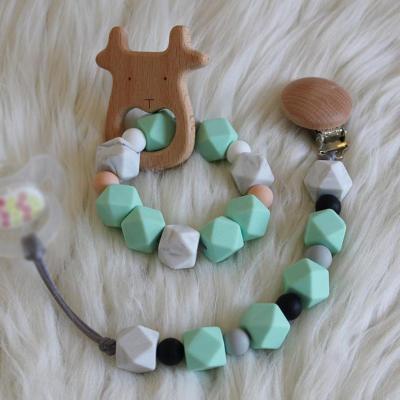 China 2pcs/set BPA Free Silicone Hexagon Pacifier Ring Bracelet Baby Sensory Teething Wooden Animal Clip Chain for sale