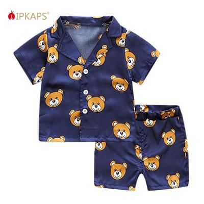 China Breathable Boy's Striped Or Plain Short Pajamas Set Children Print Satin Pajamas Kids Sleepwear for sale