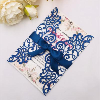 China Europe hot sale luxury laser cut wedding invitation with metal flower on the front for sale