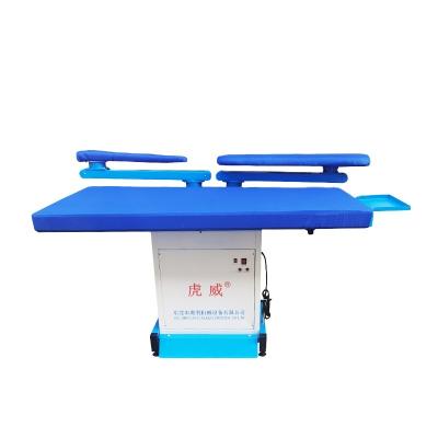 China Inbuilt with High quality Action Arm Type Air Suction Clothes Ironing Table for sale