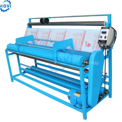 China Semi automatic cloth rewinder cloth measuring cloth slit about measuring rolling machine for sale