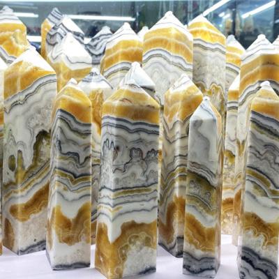 China Wholesale High Quality Natural Yellow Picture Calcite Crystal Point Healing Energh Tower from China for Home Decoration for sale