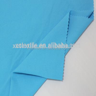 China Elastic Plain 47% PBT 53% Polyester Wholesale China UV Swimwear Fabric for sale