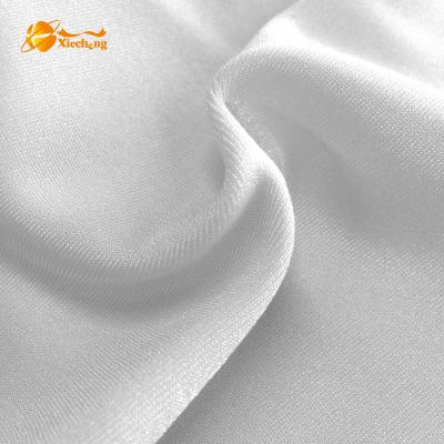 China Plain White Shiny Polyester Stretch Knit Sportswear Fabric for sale