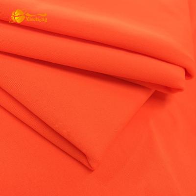 China 19% Spandex Viable Nylon 81% Swim Fabric Melon Neon Orange for sale