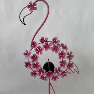 China Hot Sale Europe Metal Decoration Ornament Flamingo Wrought Iron Garden Stake With Plastic Windmill for sale