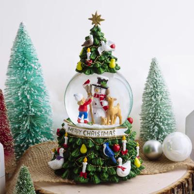 China Europe Resin Crafts Christmas Snowman Tree Snow Globe Mini Music Volume for sale