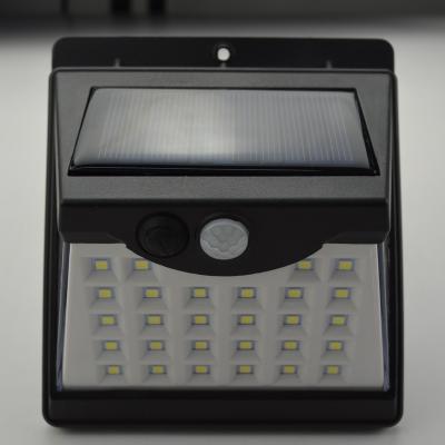 China Garden Factory Price Garden Wall Outdoor Motion Sensor Waterproof Led Solar Light for sale