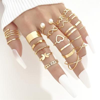 China Punk Fashion Ring Set Simple Geometric Pearl Butterfly Infinity Chian Bow Twisted Chain Rings For Women for sale