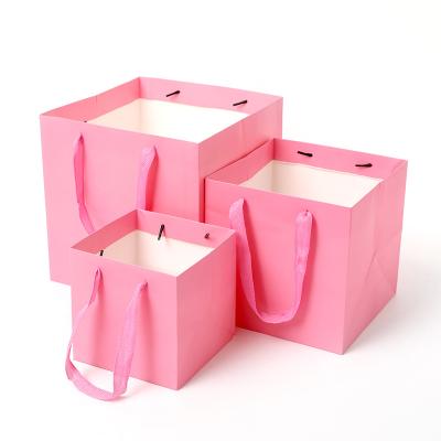 China 30*30*30cm Recyclable Square Card Bottom Paper Thickened Gift Flower Baking Packaging Paper Bag With Ribbon Handle for sale