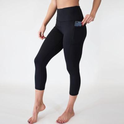 China Europe Style Empire Solid Color Antibacterial Tight Women Exercise Pants Jogging Sexy Girls Wearing Yoga Pants The Ninth With Pocket for sale