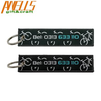 China Polyester Twill Woven Logo Keychains Fabric Keyring Airplane Souvenir Keyring Embroidered Keychain for sale