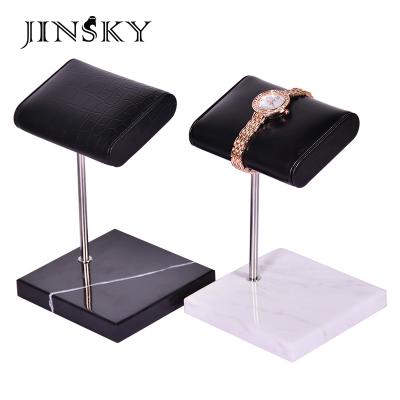 China Watch Display JINSKY Watch Stand PU Leather Watch Stand Wholesale Black White Green Marble Base Jewelry Bracelet Leather Stand for sale