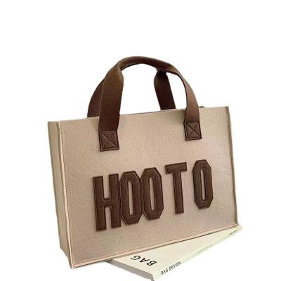 China Fashion Handled And Convenient Large Capacity Students Tote Bag Felt Material Handbag Shopping Bag With Letter Pattern for sale