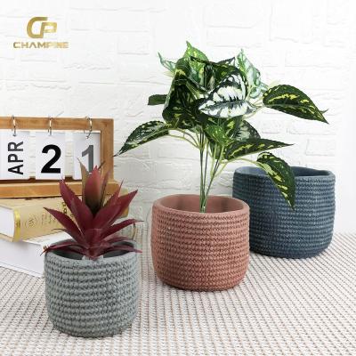 China Durable Nordic Style Three Colors Terracotta Pot Relievo Round Creative Cement Bonsai Pot Plant Concrete Flower Pots for sale