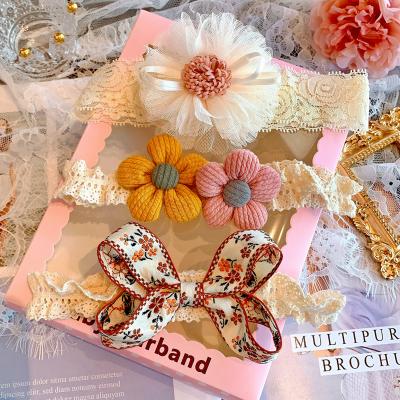 China 2021 100 days sweet high quality birthday photography sweet high quality bow headwear baby headband gift box set for sale