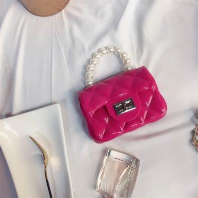 China Hot Sale Fashion Fashion Mini Pearl Bag Cute Designer Freeze Purses Children's Little Girls Clear Handbags for sale