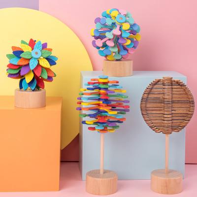 China Lollipop Toy Bar Magic Brain Developmental Wand Tree Relaxing Lollipop Wooden Educational Rotating Spinning Toy for sale